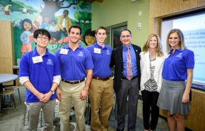 Computer Engineering seniors Kevin Yeom, James Spedick, Matthew Doyle and Emily Kossler (far right), with alumnus Gene Alessandrini ’86 EE and his wife Gina.