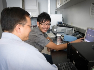 Si Qin with Yimin Zhang, CAC research professor. 