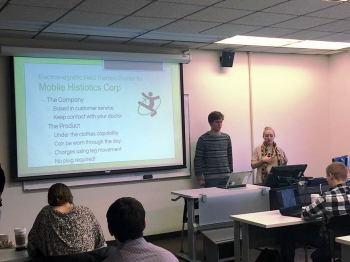 Members of the Mobile Histiotics Corp. team present their idea for Electromagnetic Field Therapy.