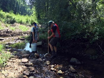 Graduate student Emily Carambelas and Dr. Stan Kemp, the project’s co-PI from the University of Baltimore, conduct stream sampling.