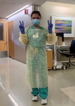 Female nurse wearing PPE.