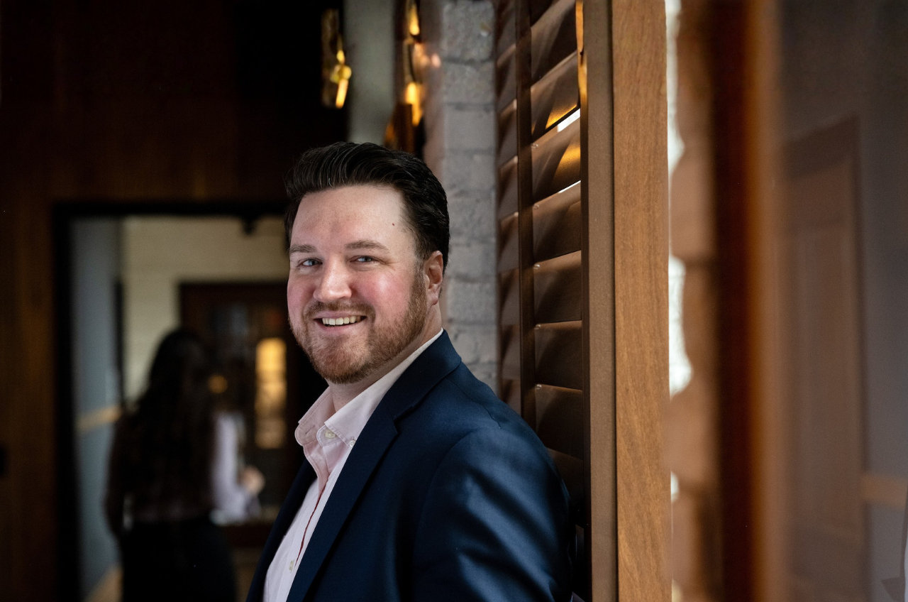 man looking at camera and smiling