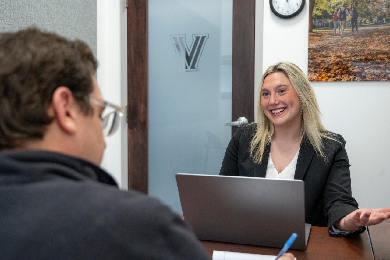 CSO692_20250415_2117_JobsInterviews A student speaking with an employer.