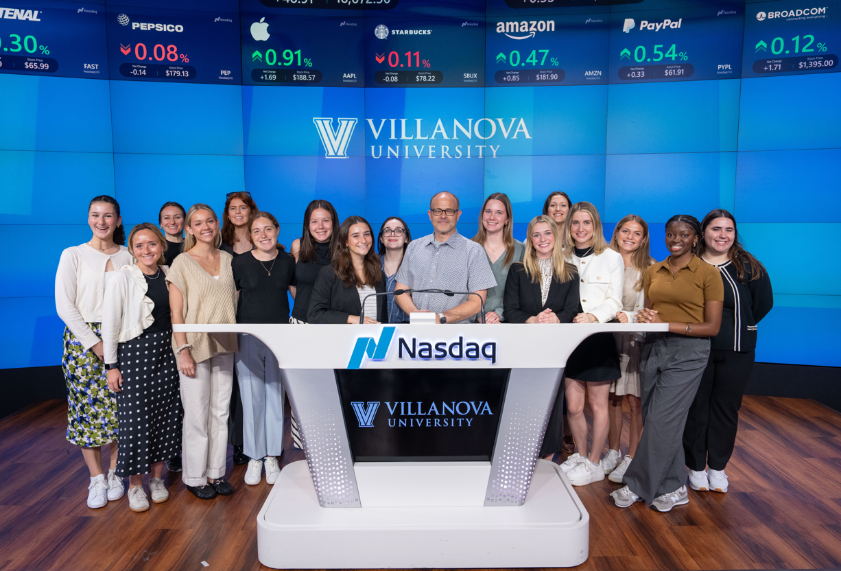 VU_Agency_nasdaq official Group of students smiling in Nasdaq building.