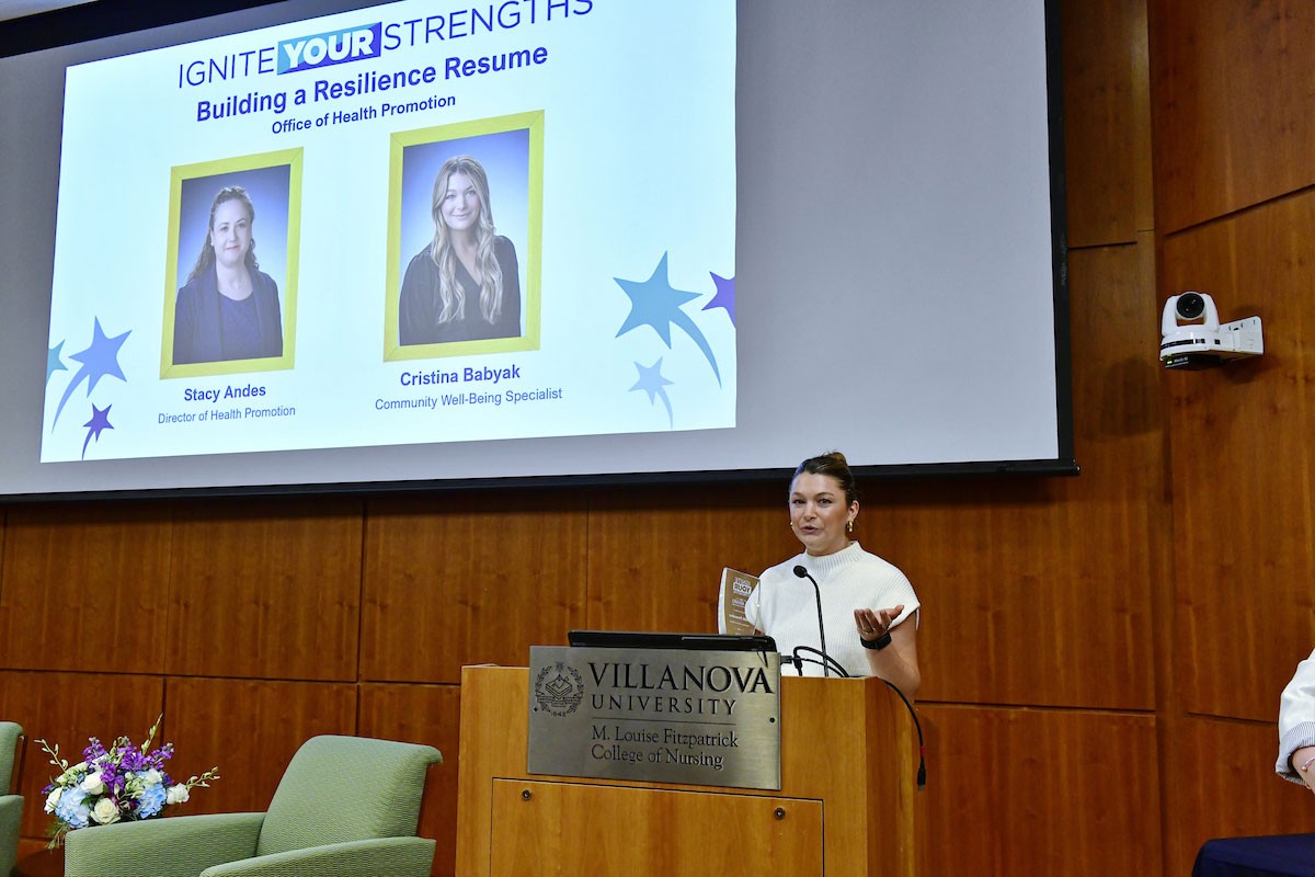 Inagural Ignite Your Strengths Award receipient speaking at podium
