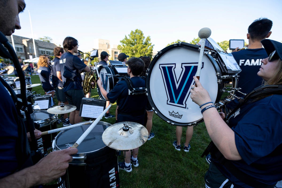 CSP061_20240822_2233 Villanova band players in a field