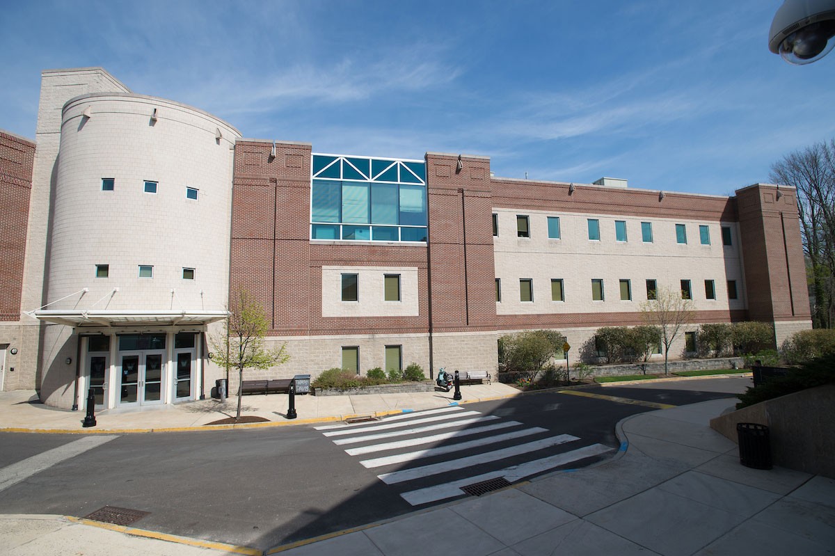 The outside of the Davis Center on a sunny day.
