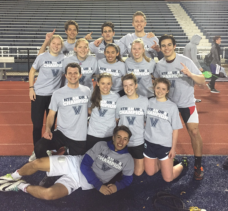 Students posing for soccer champion photo
