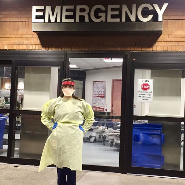 A Villanova nurse stands outside the Emergency room