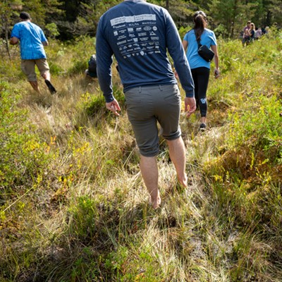 Students walking in the bog.
