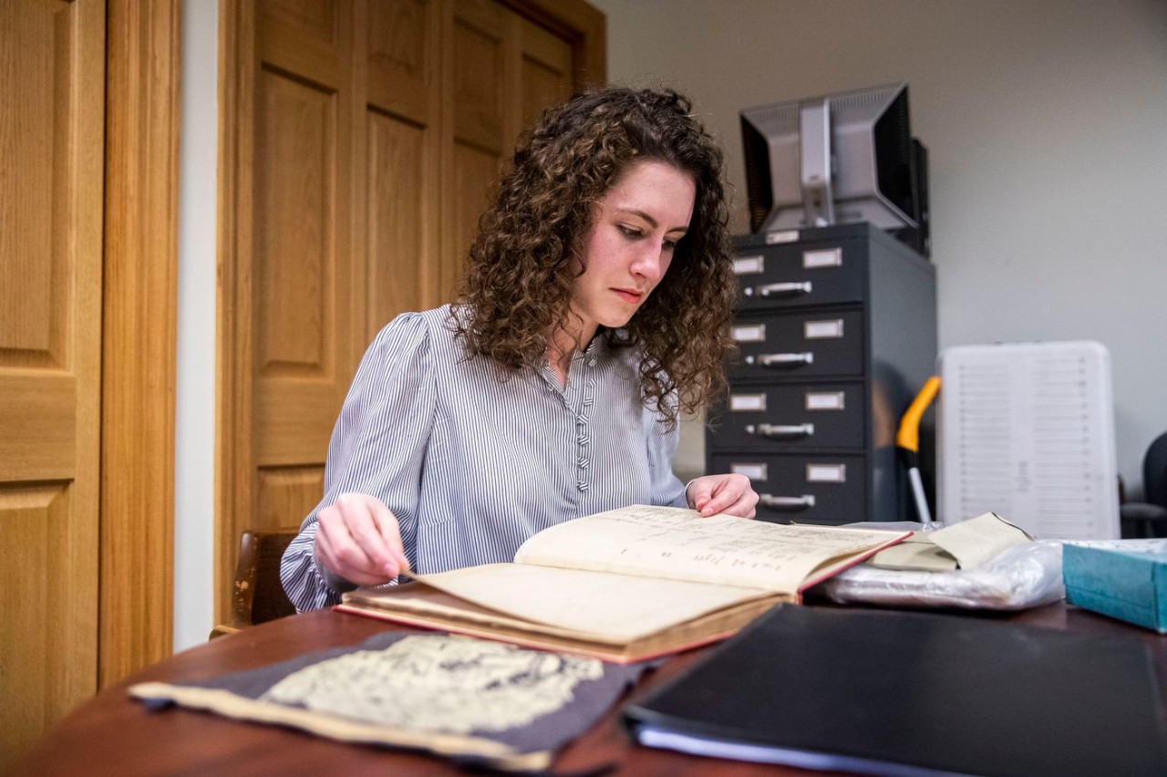 Angelina Lincoln ’18 CLAS, ’20 MA, doing archival research. Photo by the Philadelphia Inquirer. Angelina Lincoln ’18 CLAS, ’20 MA, doing archival research. Photo by the Philadelphia Inquirer.
