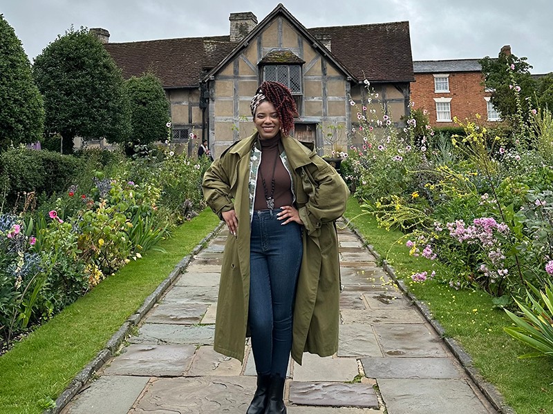 Villanova Theatre alumna Taahira Davis ’23 MA standing in front of Shakespeare's home Villanova Theatre alumna Taahira Davis ’23 MA standing in front of Shakespeare's home