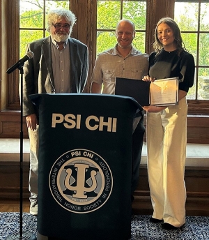 Kerry Buckhaults '23 MS (right) receives the Ingeborg L. and O. Byron Ward Outstanding Thesis Award from Psychological and Brain Sciences Chair Mike Brown, PhD, (left) and thesis advisor Ben Sachs, PhD. Kerry Buckhaults '23 MS (right) receives the Ingeborg L. and O. Byron Ward Outstanding Thesis Award from Psychological and Brain Sciences Chair Mike Brown, PhD, (left) and thesis advisor Ben Sachs, PhD.