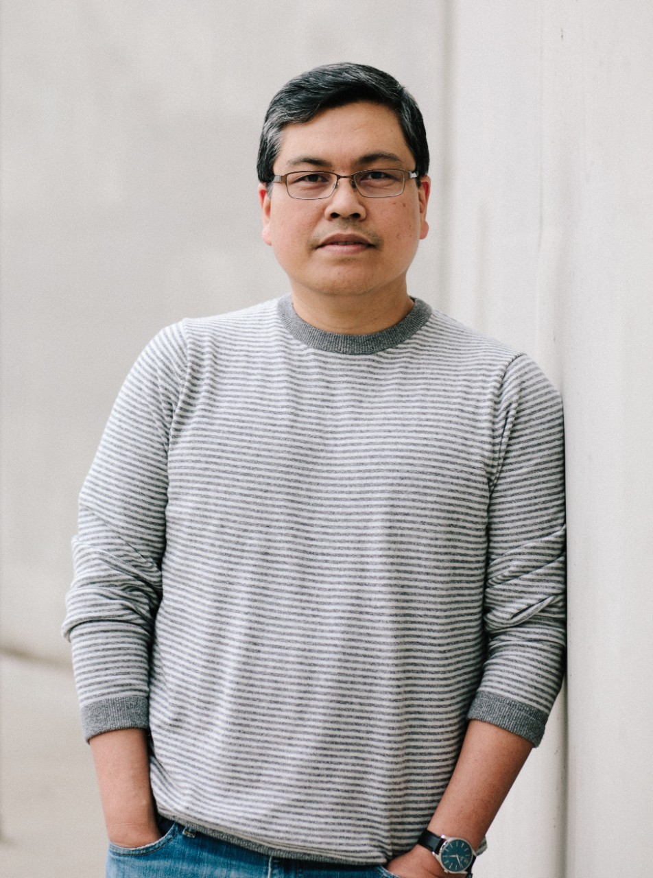 Rick Barot A man with glasses