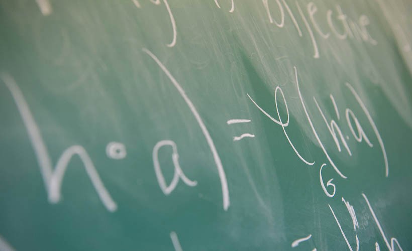 Department of Mathematics and Statistics image of math formula on chalk board.