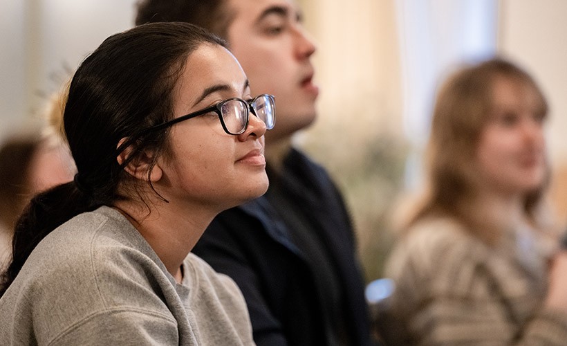 Students listen to an engaging lecture.