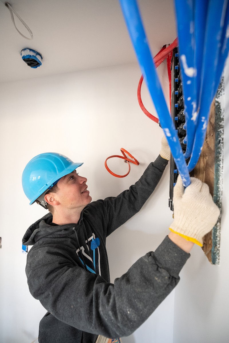 A student volunteering at a Habitat for Humanity build