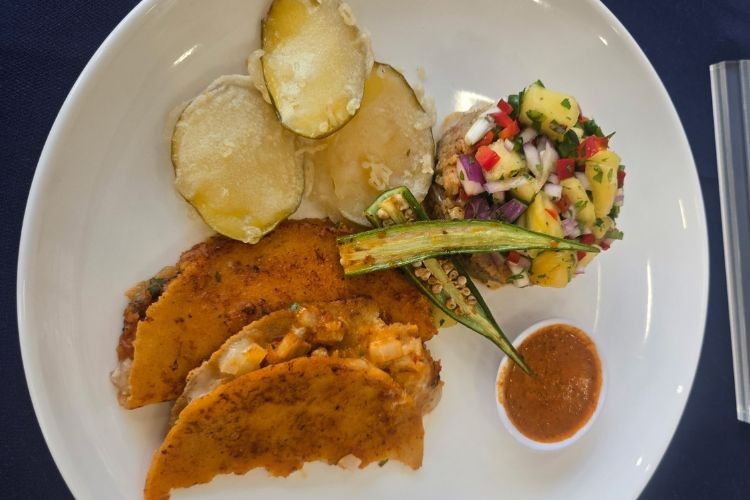 Chef Harris cooked catfish birria tacos with an okra pineapple salsa and a side of catfish dirty rice for the 2026 NACUFS Culinary Challenge. Chef Harris cooked catfish birria tacos with an okra pineapple salsa and a side of catfish dirty rice for the 2026 NACUFS Culinary Challenge.