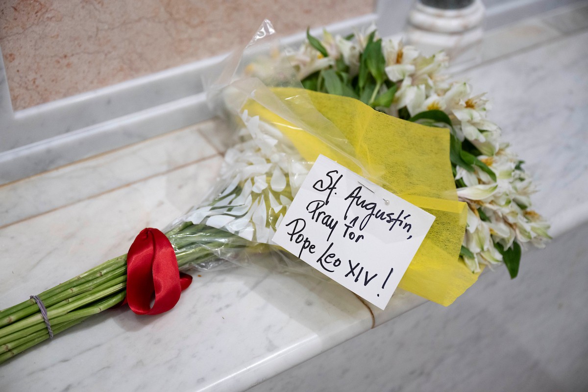 Flowers and a message that offers hope and prayer for Pope Leo XIV upon his election in 2025 Flowers and a message that offers hope and prayer for Pope Leo XIV upon his election in 2025