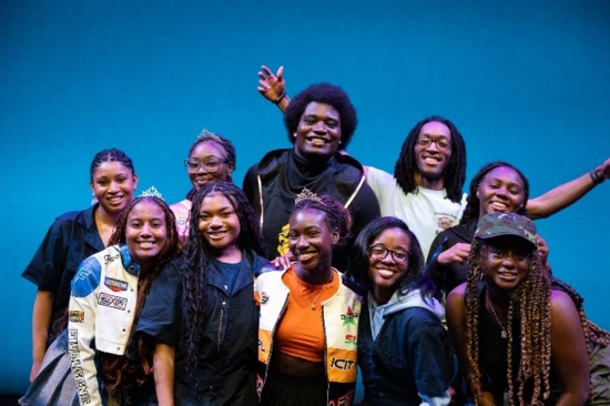 Nova Step Nation students posing in front of blue background