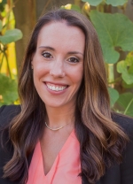 Woman with blonde short hair smiling