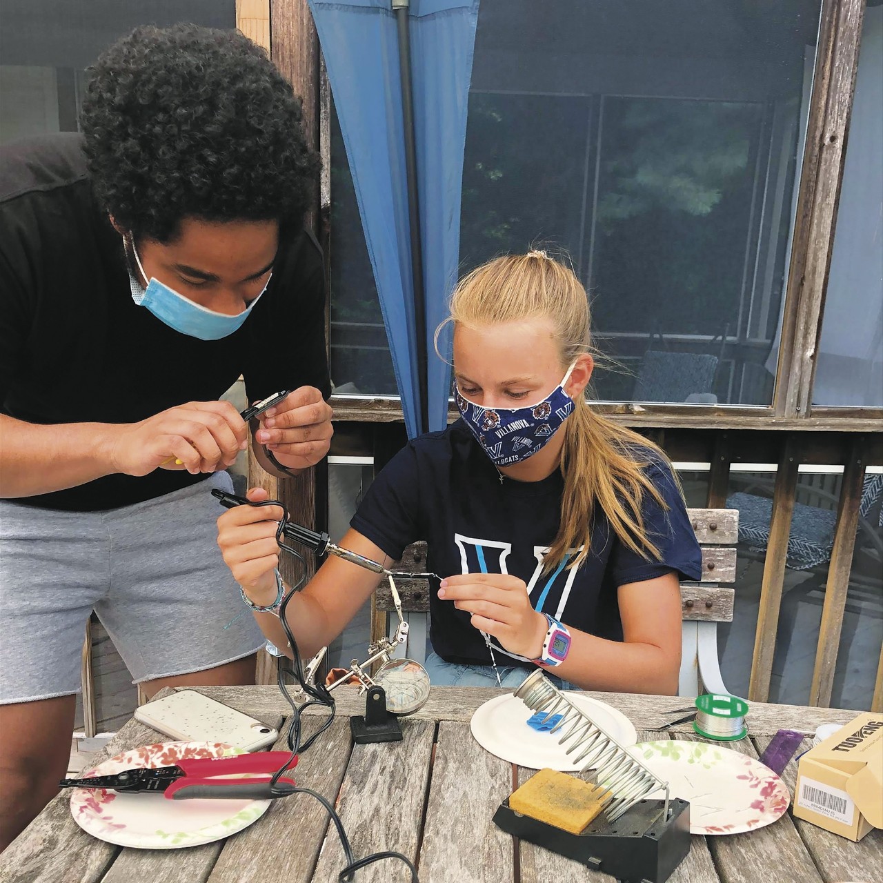 Students working together to design a treatment for infant health