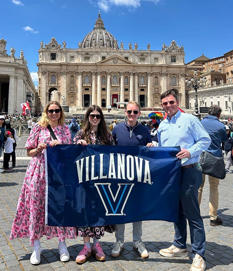 Villanovans posing with a Villanova flag in Rome