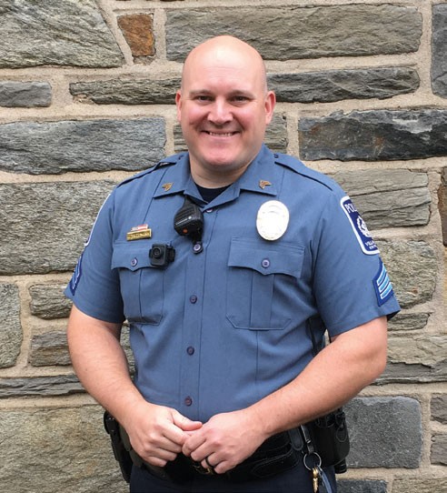 Public sfaety officer smiling in uniform