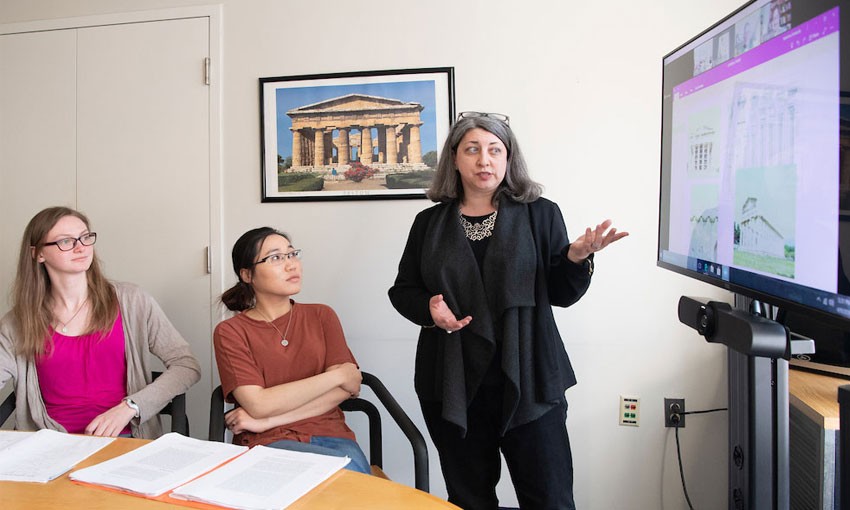 Professors and students viewing image on screen