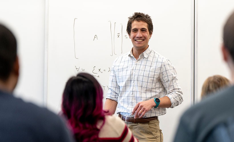 Faculty member teaching in classroom