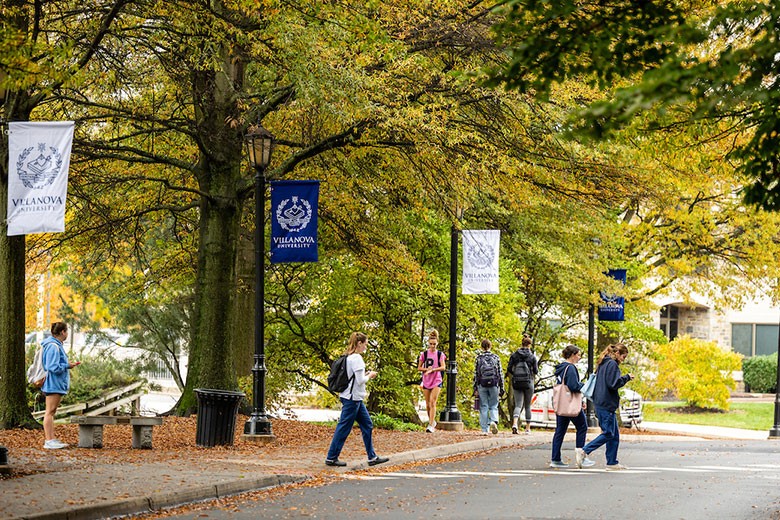 students-walking-on-campus Students walking through campus