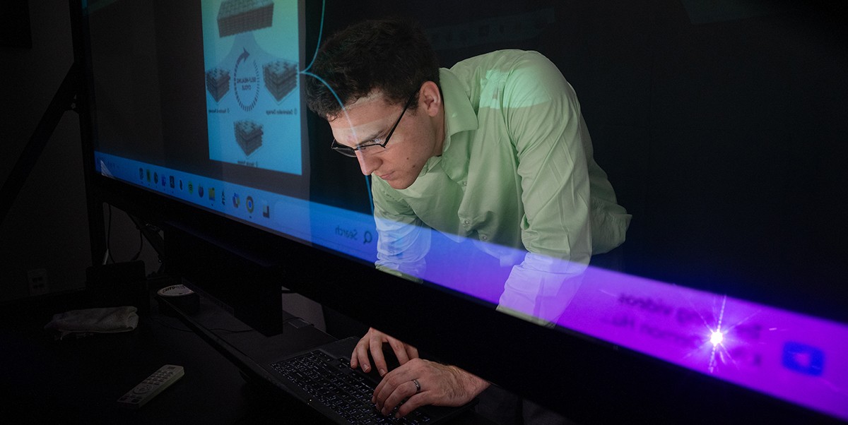 hpc-home professor working at computer station