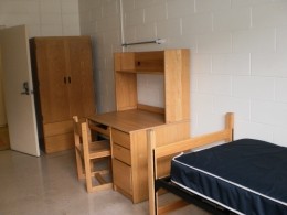 Delurey Hall room View of a bed, desk and wardrobe in a Delurey Hall room.