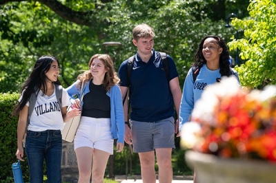 SLLC-Augustinian four students walking on the Cabrini campus