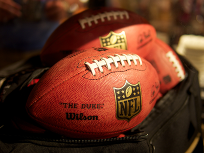 a bag of nfl footballs