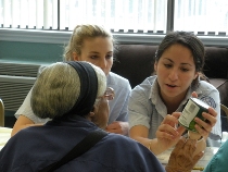 Christina Schirripa teaches a resident about food labels along with Lindsay Dudek Christina Schirripa teaches a resident about food labels along with Lindsay Dudek