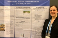 Meghan Galvin presents Marisa Kellogg’s poster about her work in Haiti.