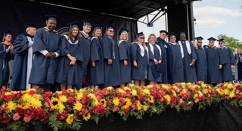 commencement-2019-800x600 College of Professional Studies (CPS) students Vince Amabile and Priscilla Holmes were recently inducted into the Tau Phi Chapter Phi Alpha Theta History Honor Society. To receive this honor, inductees must have earned a minimum of 12 credits in history, maintained a minimum 3.1 GPA in history courses, maintained a cumulative GPA of 3.0, and must be ranked in the top 35% of their class.