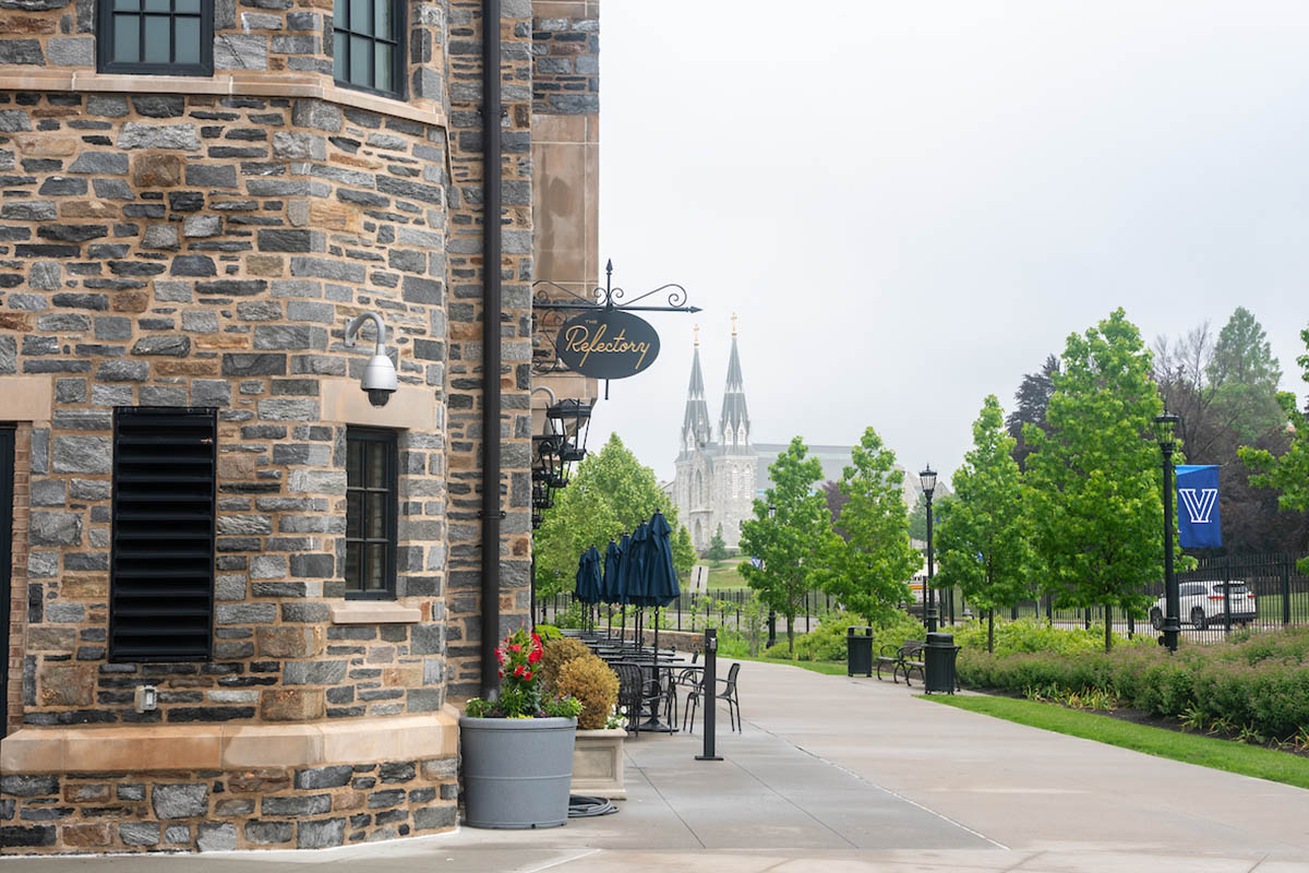 Outside of the Refectory with the Villanova church in the background