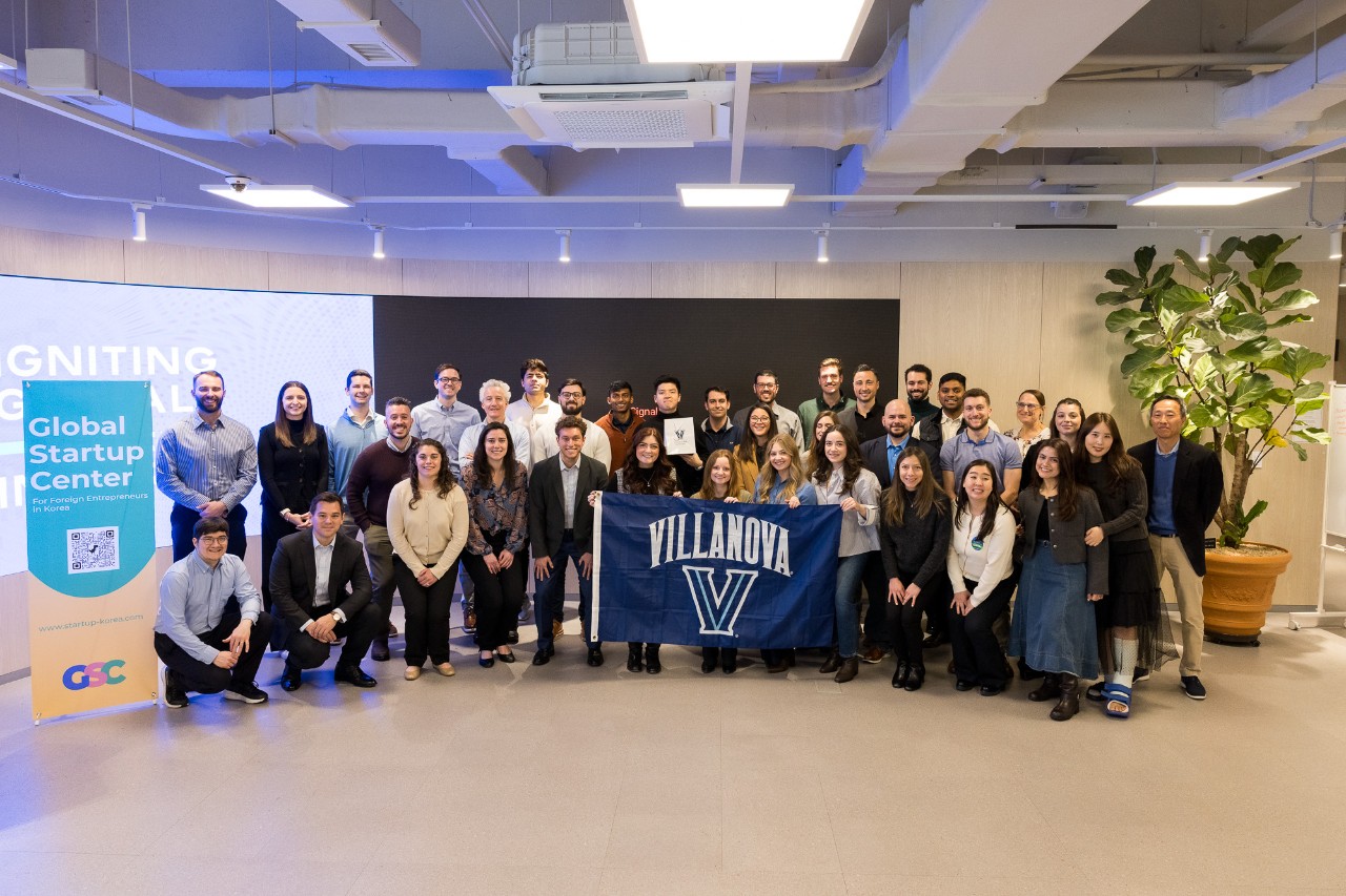 A group of students stand together in South Korea.
