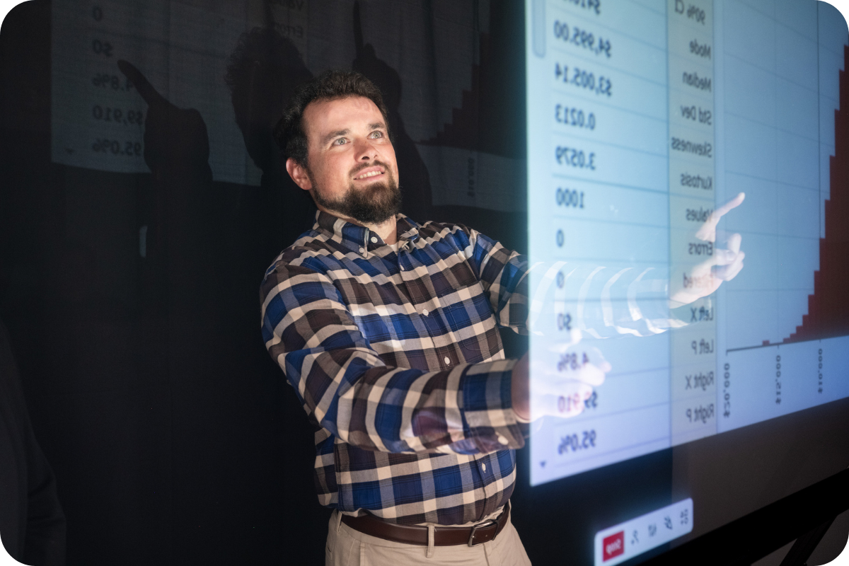 Student in front of board