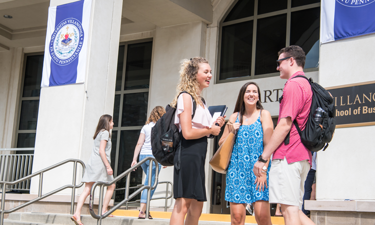 students talking outside