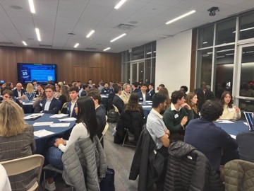 People sitting at conference tables