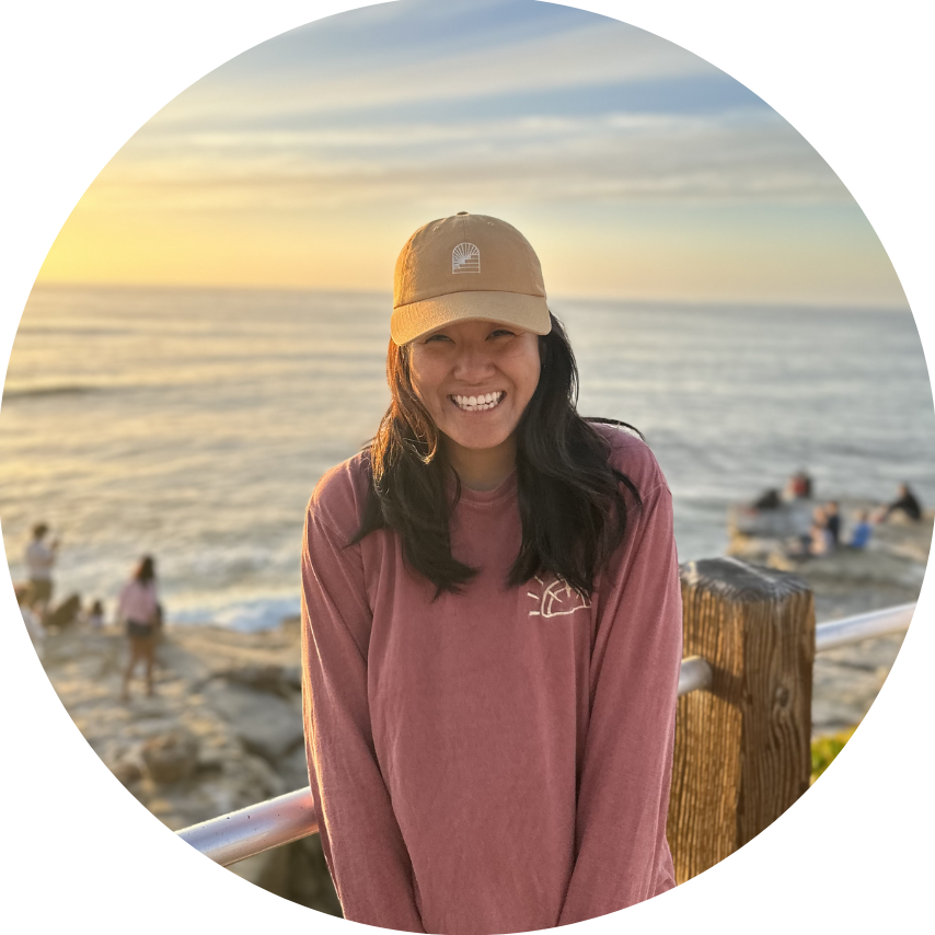 Angela Chen, with the beach in the background
