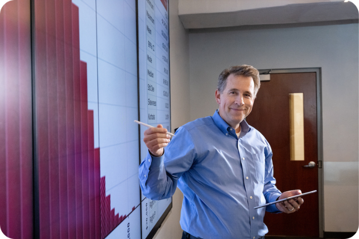 Professor teaching at board