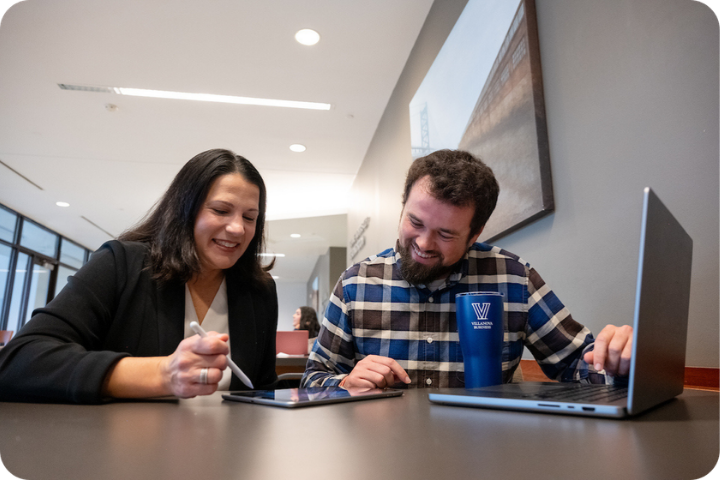 Two people working together