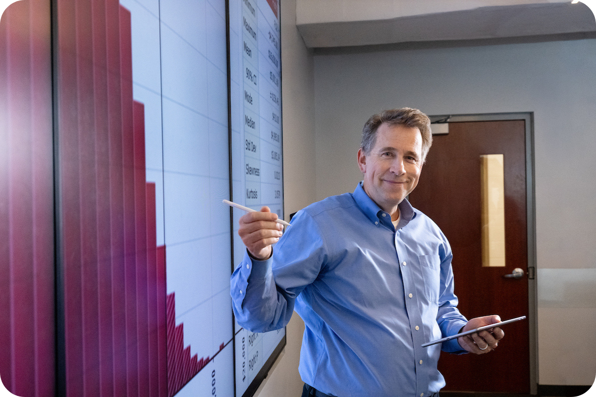 Professor teaching at board