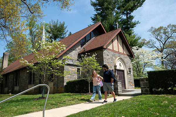 Cabrini Health Services building with students walking in front