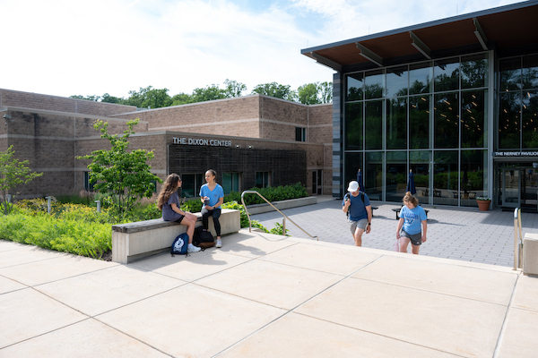 Dixon Center with students milling about in front