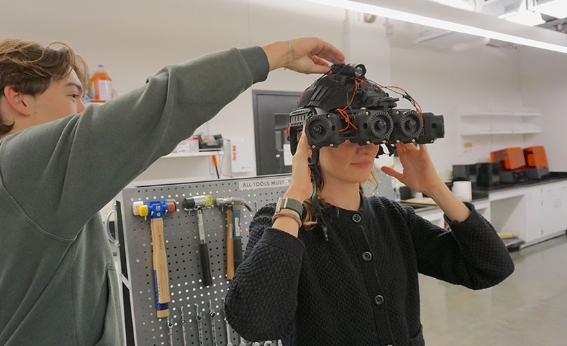 A female Engineering student experiences virtual reality.